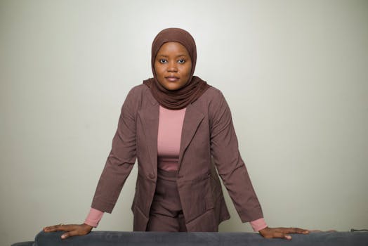 Portrait of a confident Nigerian businesswoman wearing a hijab, showcasing leadership and professionalism.